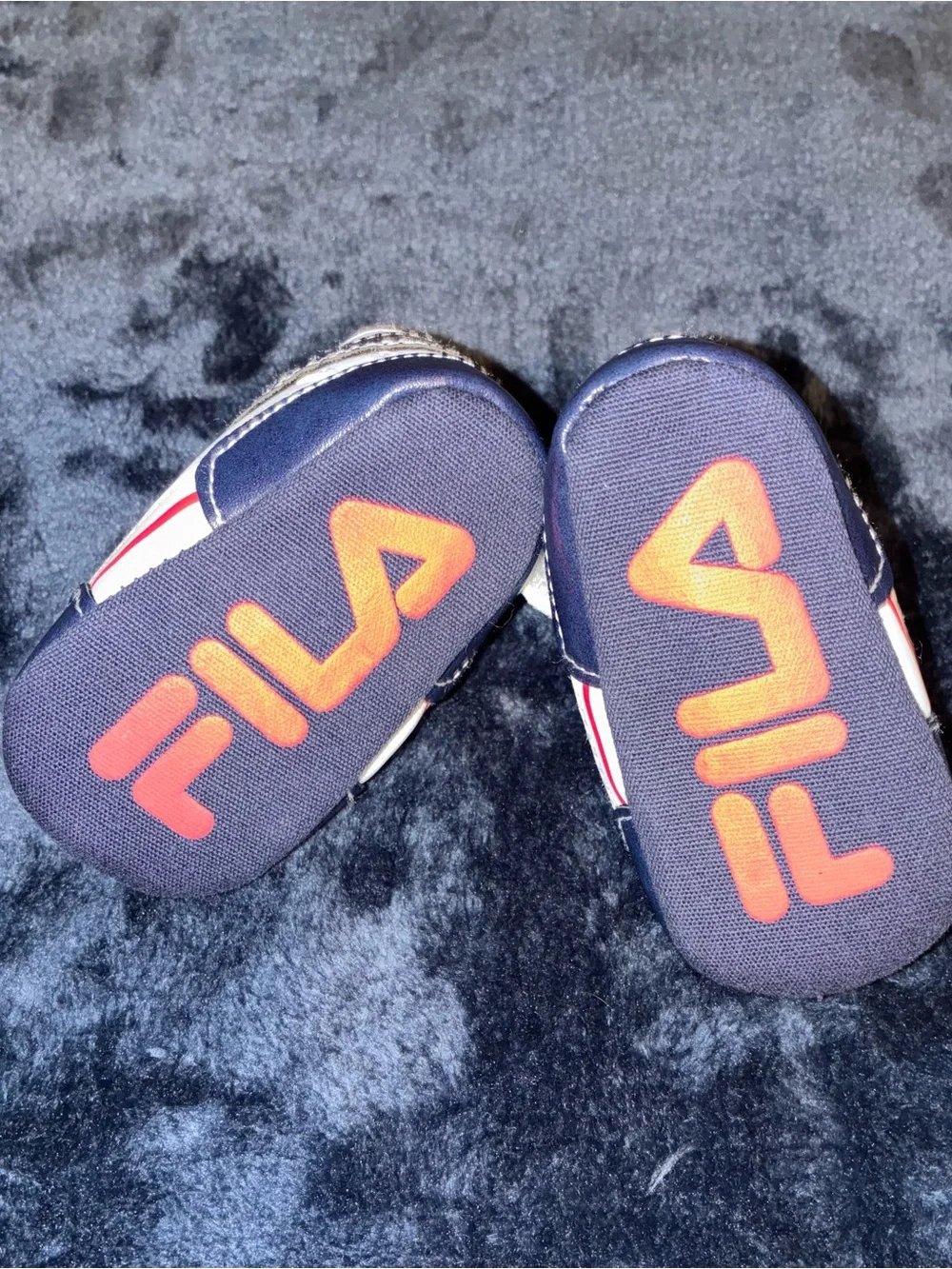 Fila White Baby Sneakers with Navy Toe and Red Logo